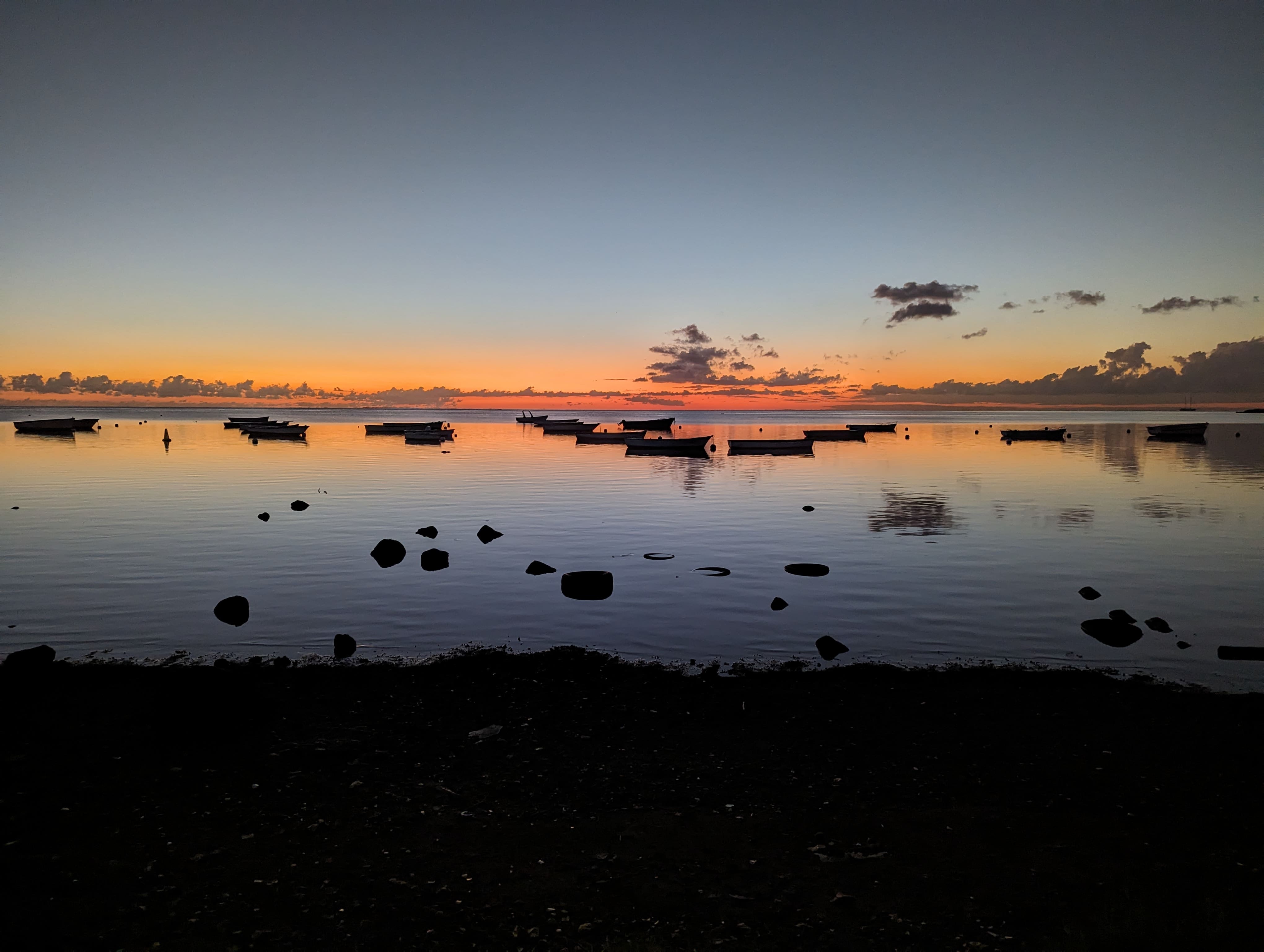 mauritius sunset view point on le morne and boats